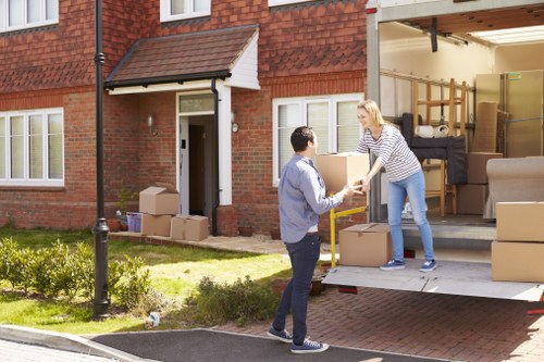 Local man and van loading furniture in Swiss Cottage