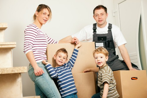 Moving van and business items being prepared for a commercial move in Swiss Cottage