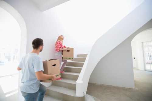 Packed boxes and moving equipment prepared for a local home move